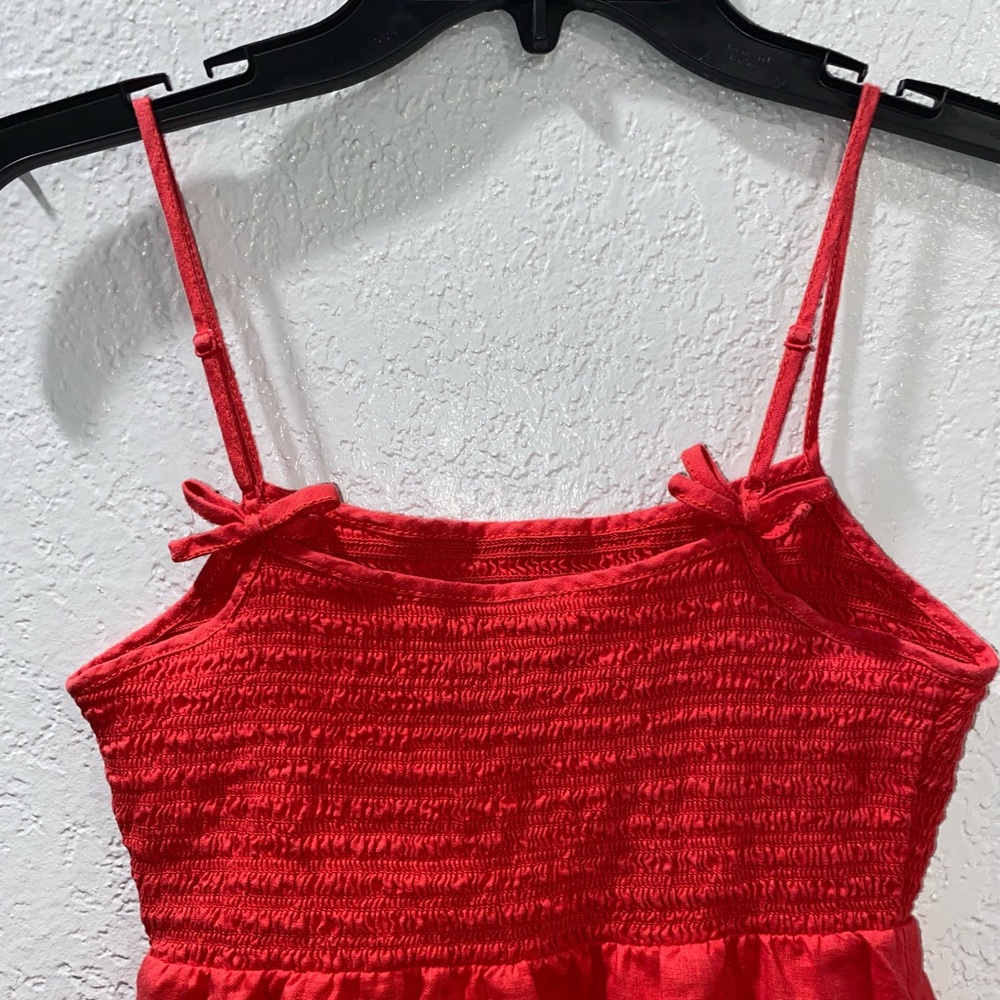 Juicy couture red dress, floral embroidered trim, bows on the straps & pockets